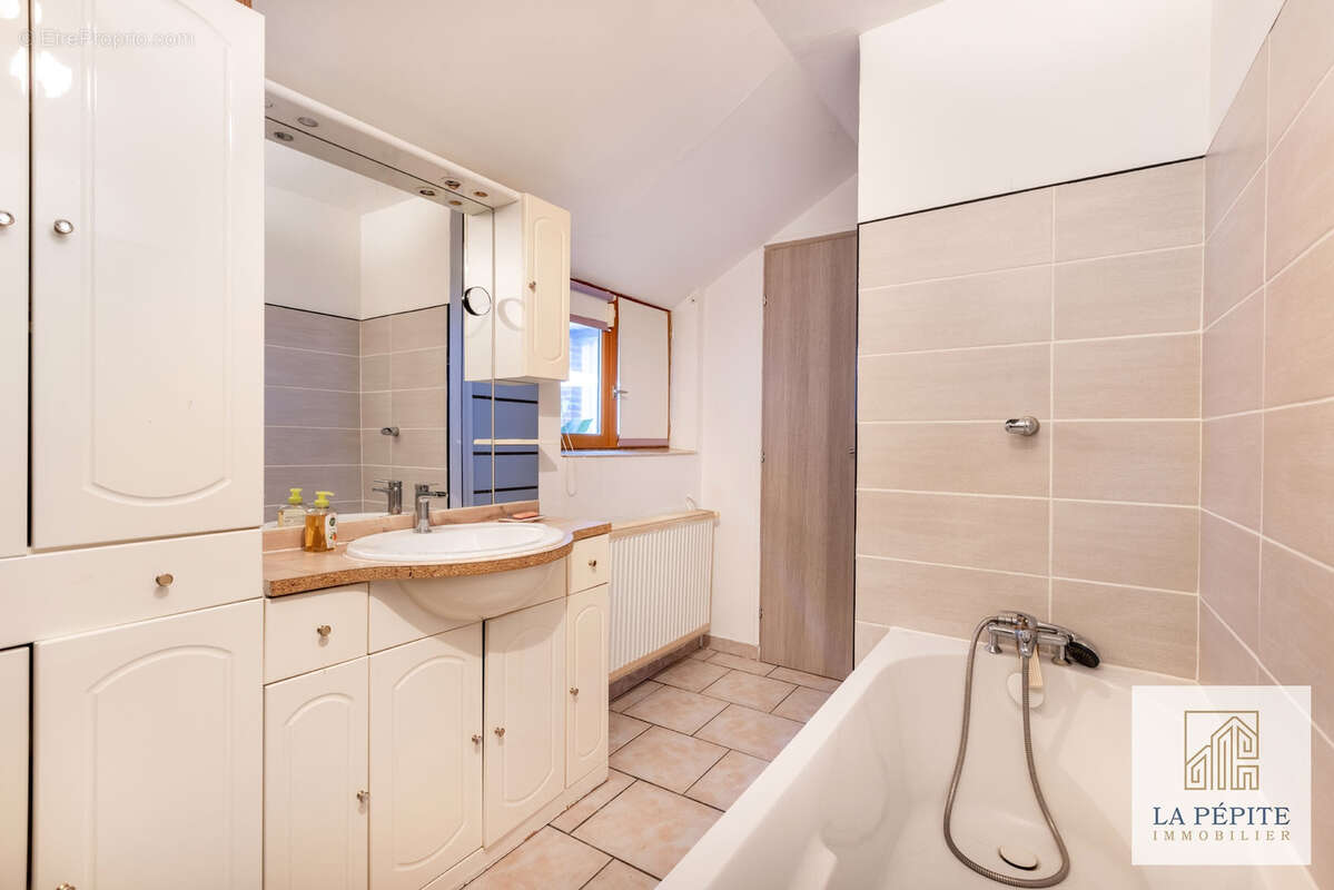 Maison familiale 131 m2 - 4 chambres - Jardin - DPE C - Saint-Amand-les-Eaux - photo 11