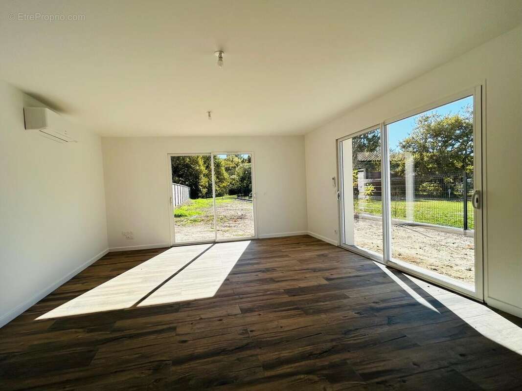 Photo 2 - Maison à BELIN-BELIET