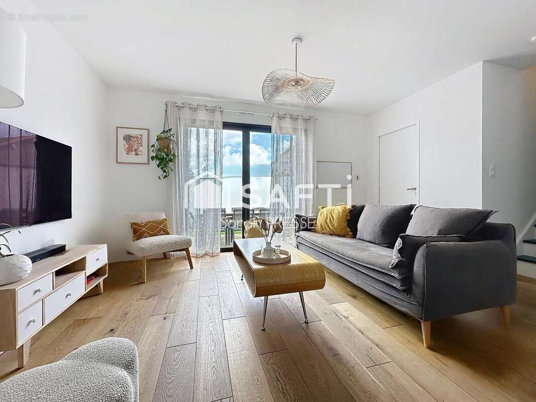 Photo 2 - Maison à SAINT-JULIEN-DE-CONCELLES