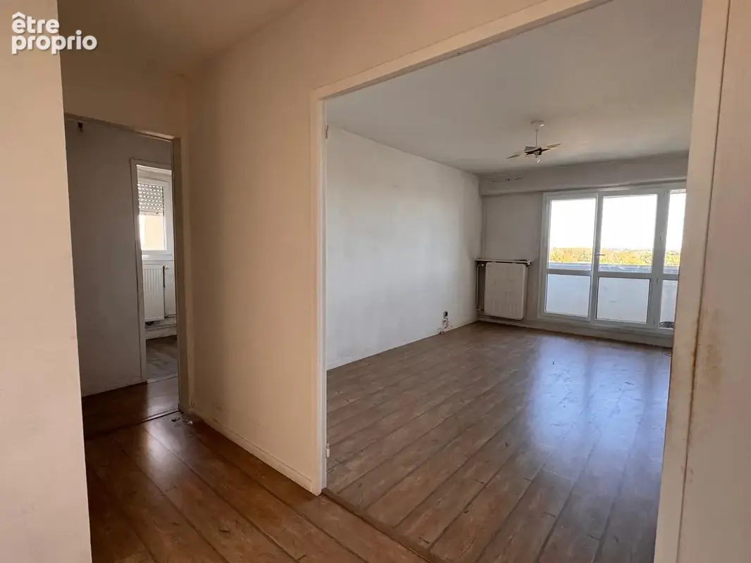 Vue exceptionnelle   76 m2   10e étage avec ascenseur   parking + cave   110 000 € - photo 11