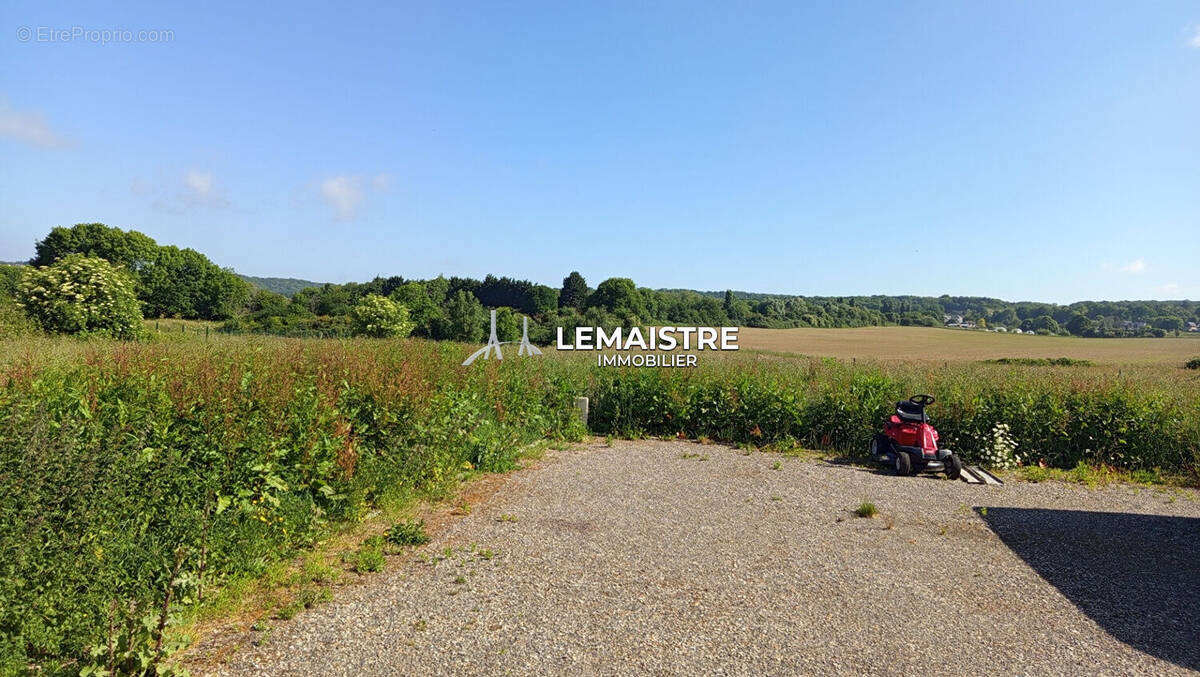 Terrain à NOTRE-DAME-DE-GRAVENCHON