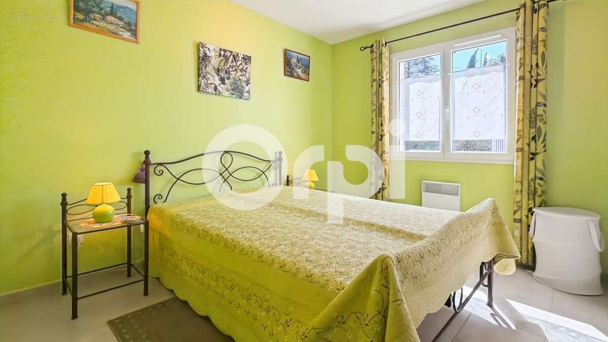 Maison À Vendre sur 1500m² de terrain arboré - photo 17