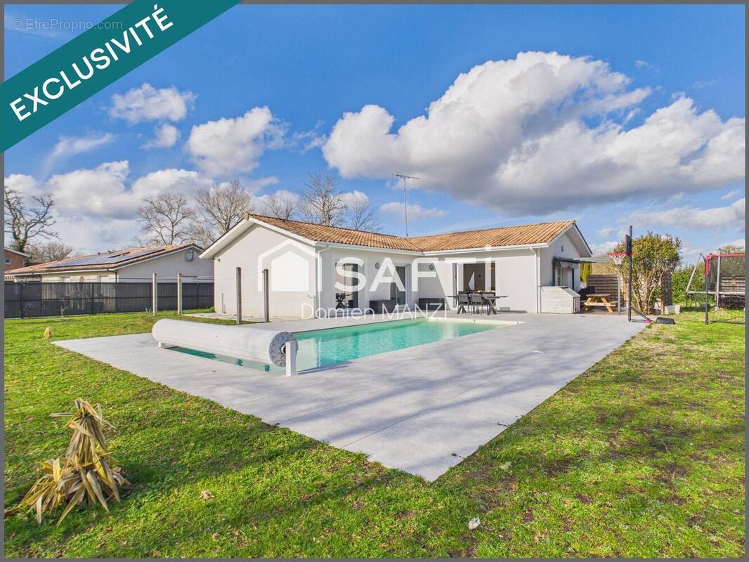 Photo 1 - Maison à BELIN-BELIET