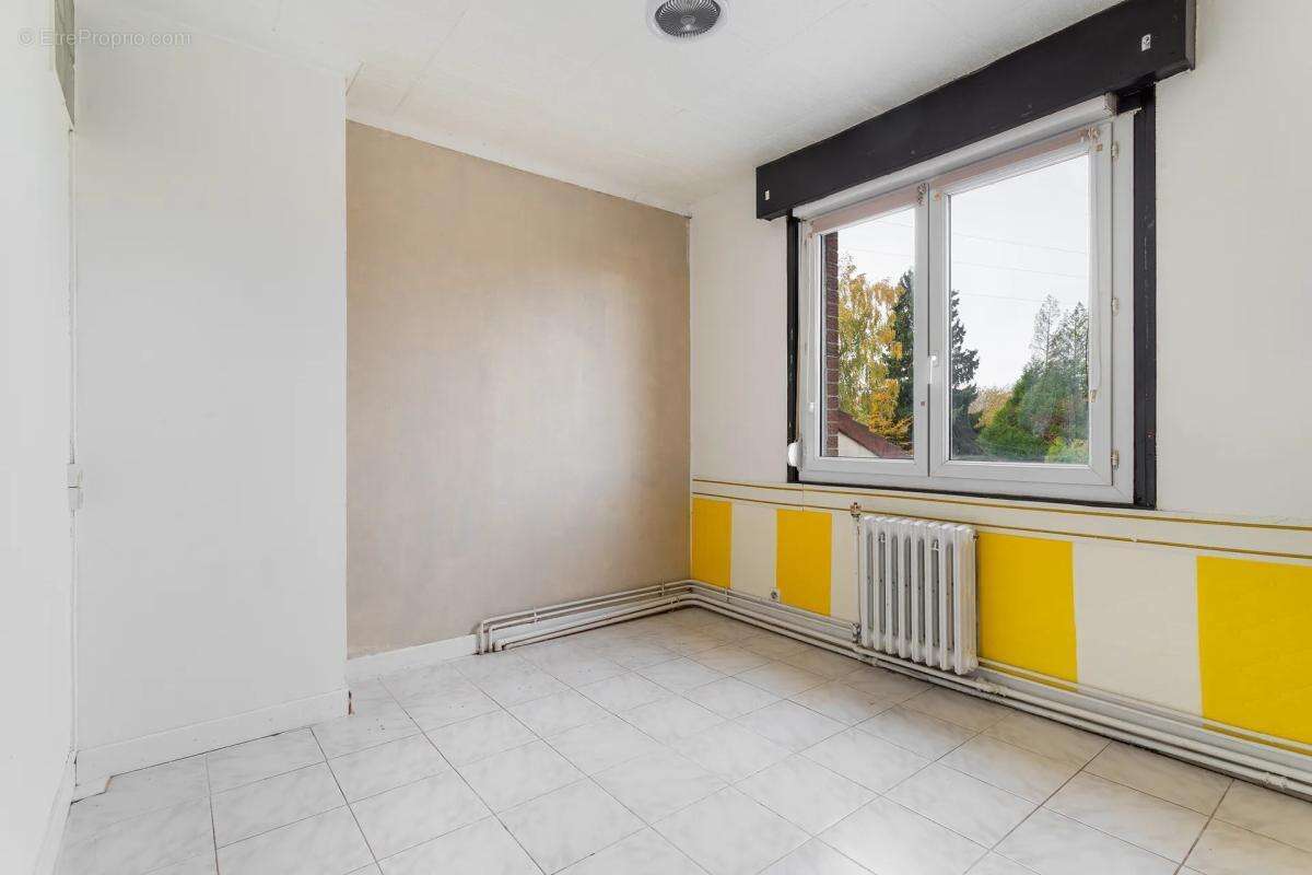 Maison à COURRIERES