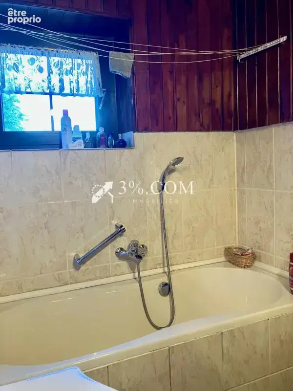 Maison sur les hauteurs avec terrain boisé - photo 11