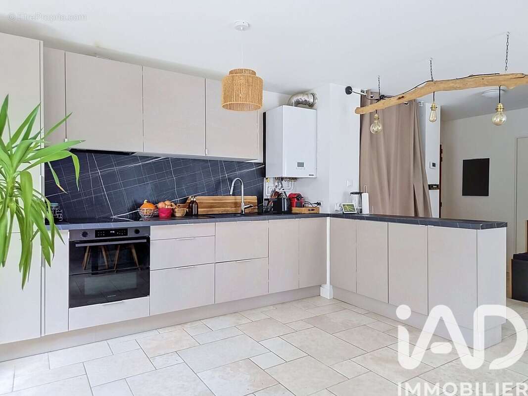 Photo 5 - Appartement à SAINTE-GENEVIEVE-DES-BOIS