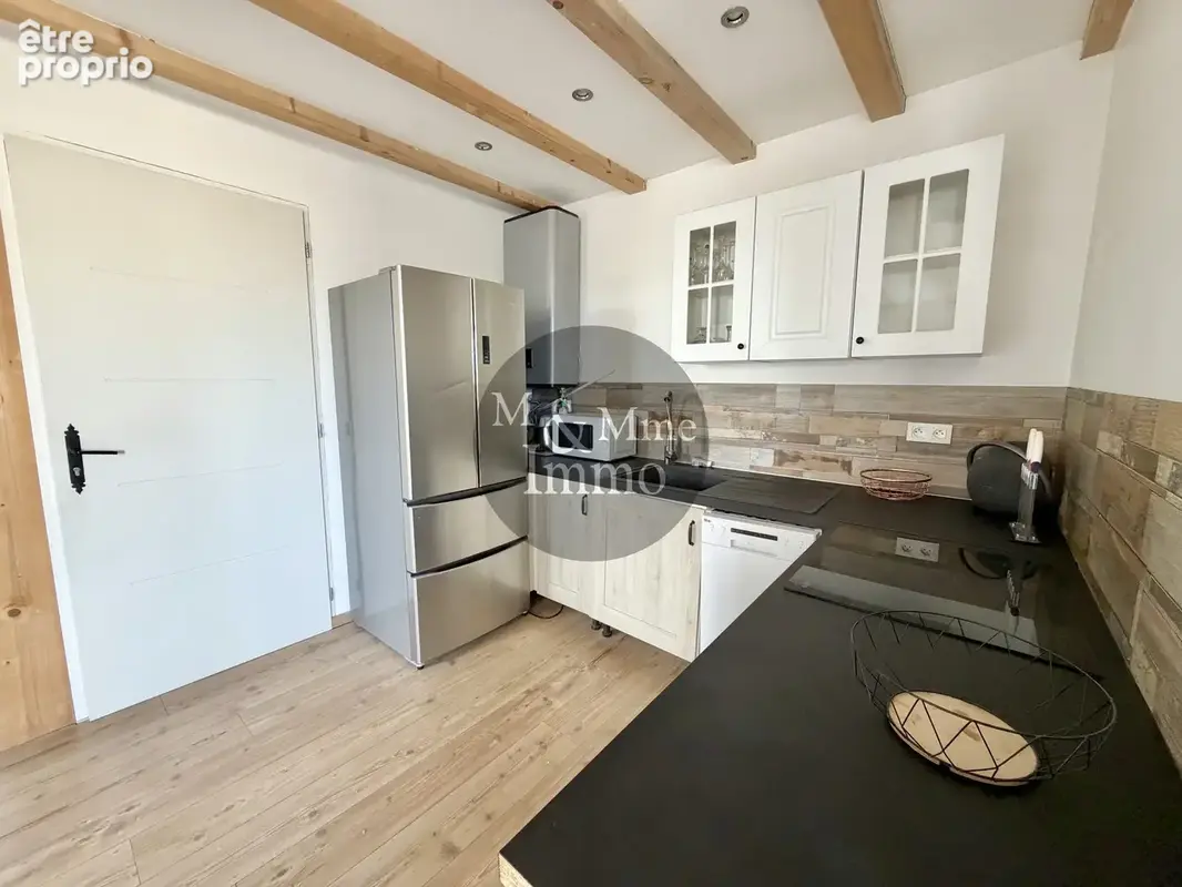 Appartement rénové avec toit-terrasse - photo 7