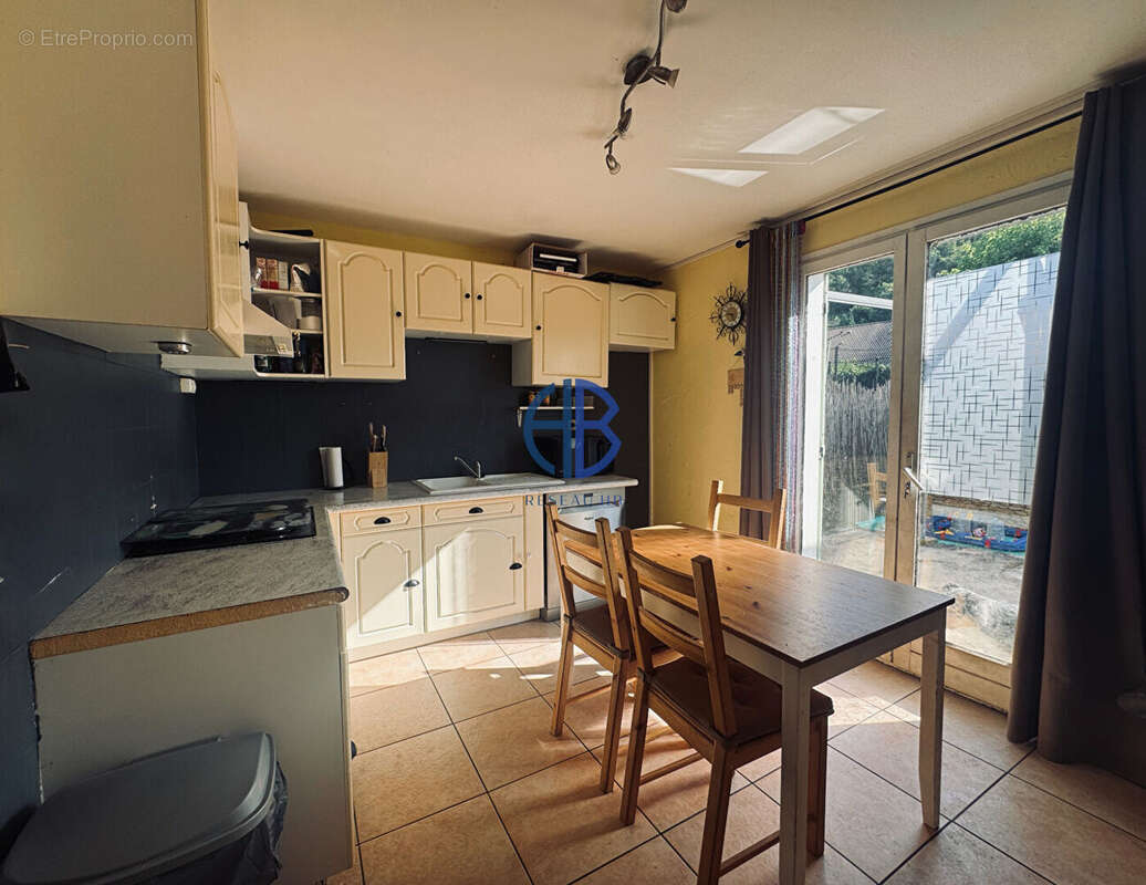 maison mitoyenne sur deux niveaux avec terrain - photo 8