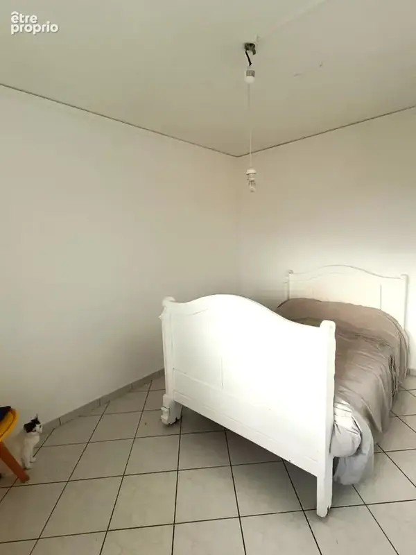 A vendre T4 proche centre-ville avec travaux - photo 6