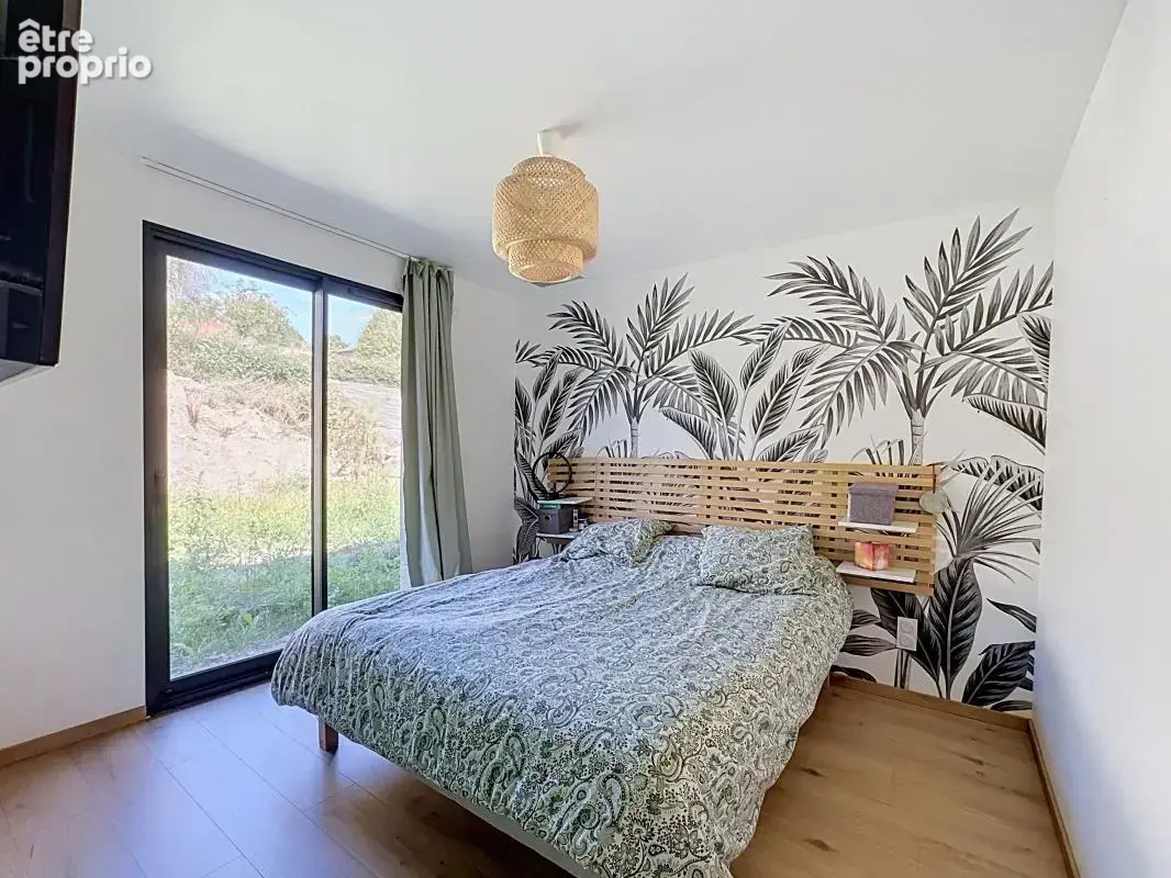 ENVAL PLAIN PIED 114m² Pièce de vie 54m² 3 chambres Terrain Belles prestations - photo 6
