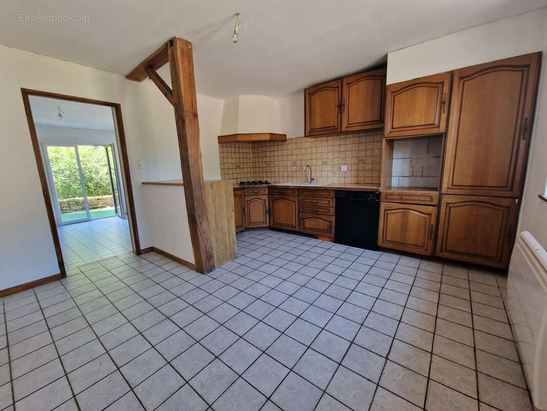 Appartement à vendre 3 pièces en rez-de-jardin proche de EPINAL (88) avec TERRASSE et TERRAIN - photo 2