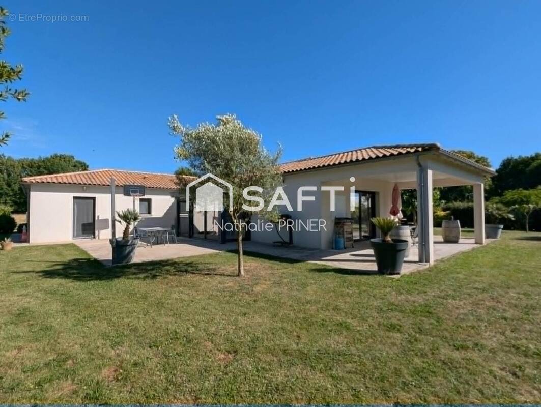 Photo 1 - Maison à VOUILLE