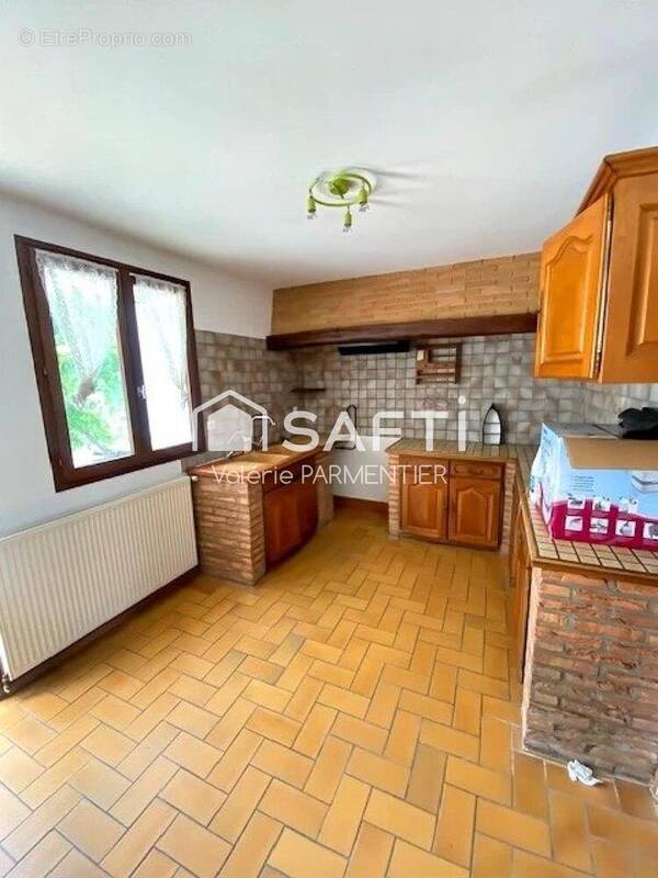 Photo 1 - Maison à RANG-DU-FLIERS