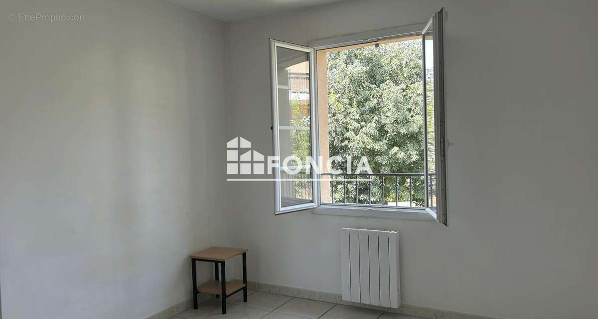Appartement de 47 m2 avec terrasse de 6,60 m2 et Double stationnement intérieur privatif - Quartier des Viougues - photo 4