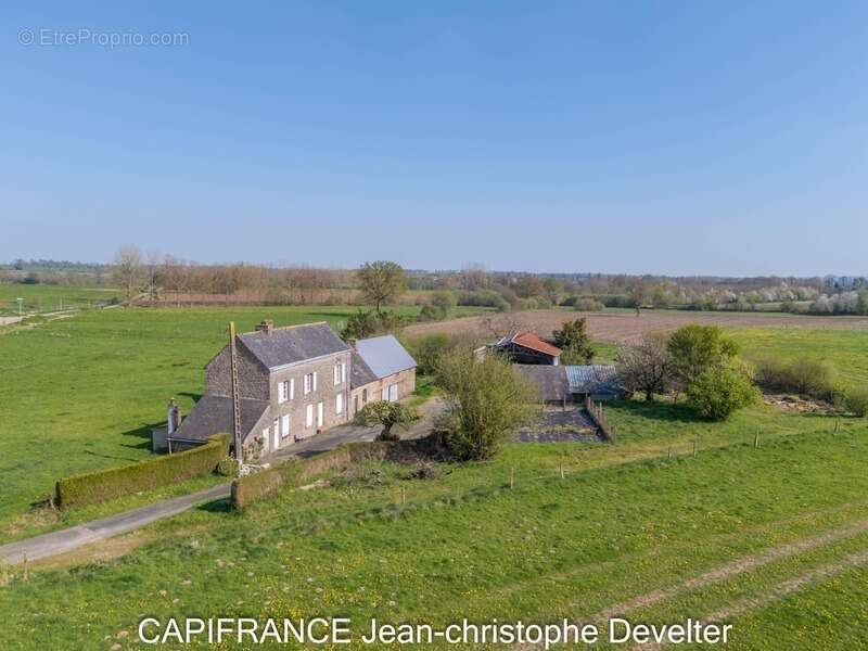 Maison à vendre GORRON (53) maison en pierres 3 chambres avec dépendances sur terrain de 3450 m2 - photo 2