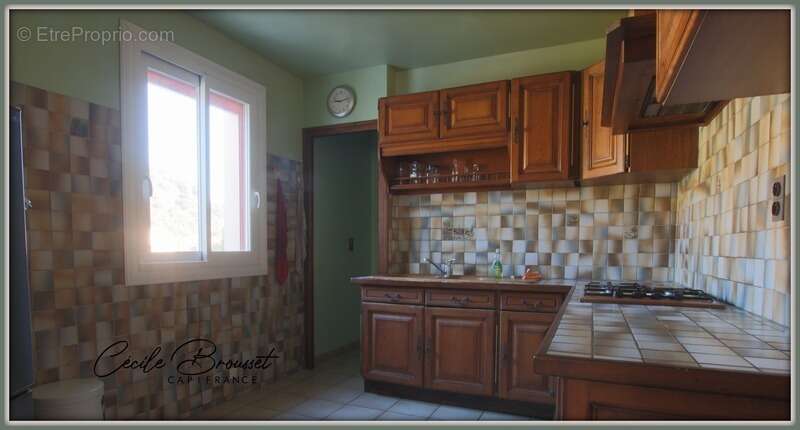 Villa 4 faces à vendre sur 1425 m2 de terrain avec garage et studio indépendant à REYNES (66) - photo 10