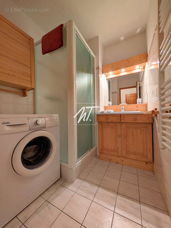 Appartement en rez de jardin à proximité du village - photo 8