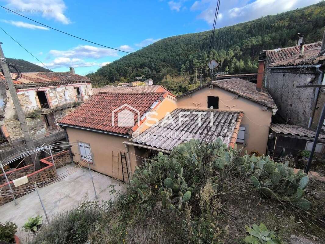 Photo 2 - Maison à ROBIAC-ROCHESSADOULE
