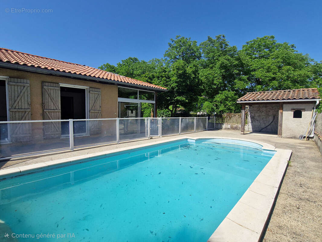 Maison de plain pied avec jardin, piscine et garage - photo 2