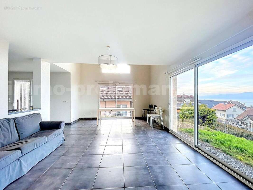 Maison_individuelle_Saint_Gingolph_proche_frontière_Suisse_Lausanne_Vallais_villa_volume_vue_Lac_léman_montagne_commodité_salon_séjour_cuisine_idéal_investisseur - Maison à SAINT-GINGOLPH