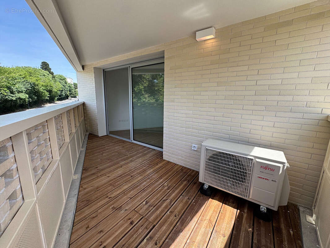 Appartement Toulouse 3 pièces de 63m² + Terrasse + parking sous-sol ! - photo 2