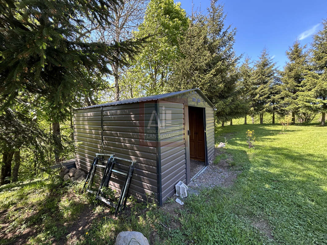 Maison de plain-pied sur terrain arboré de 2 200 m2 - photo 11