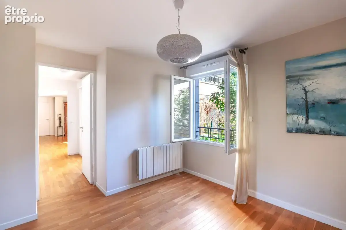 T4 de 78 m² avec jardin de 36 m² – Centre-ville – 2 chambres – 46 m² de pièce de vie – Parking - photo 7