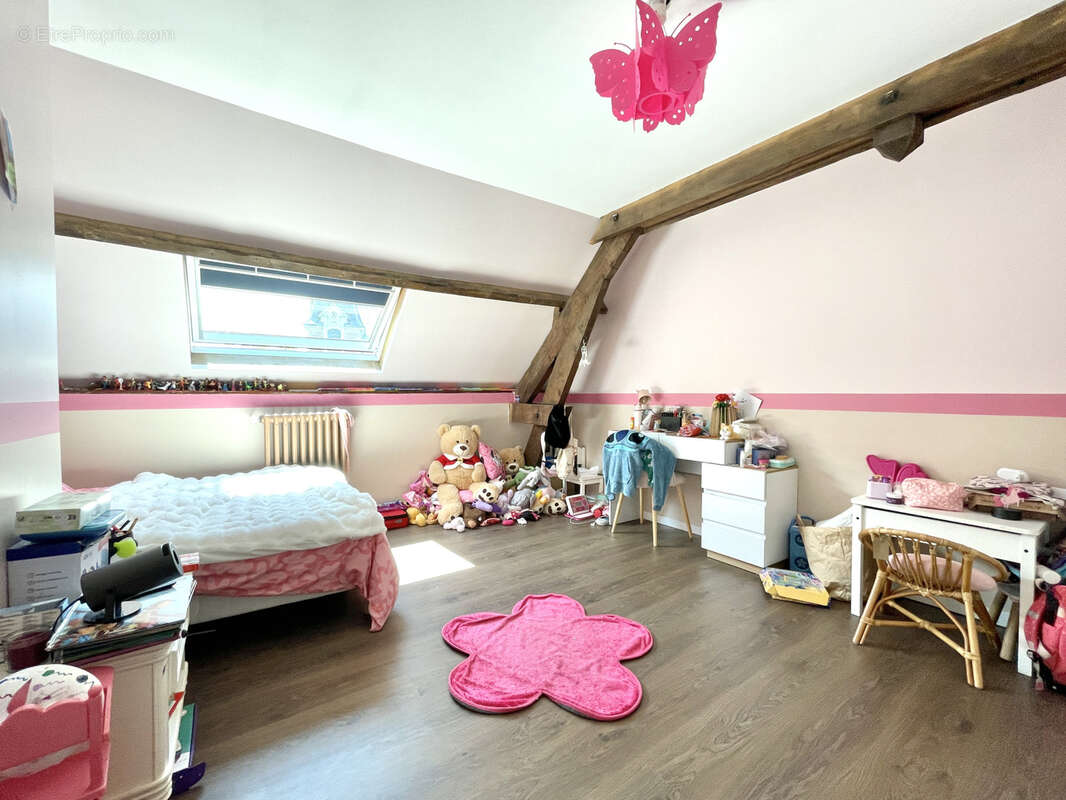 Maison avec beaux volumes - 3 chambres - garage et jardin - photo 14