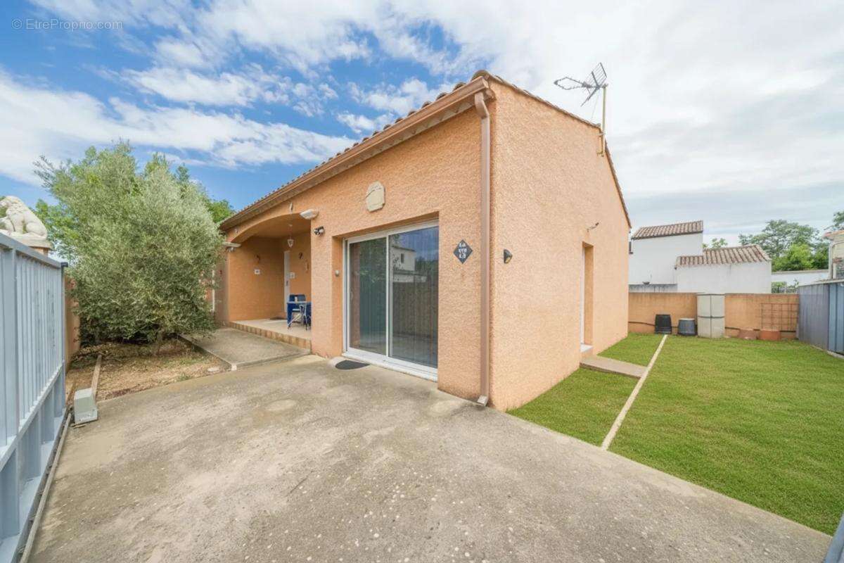 Maison 4 pièces de 104 m² à Adissan - photo 2