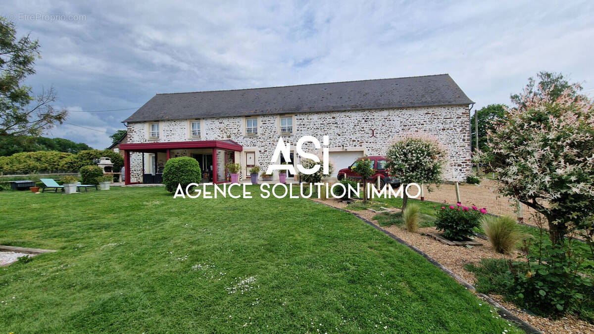 Maison à ARQUENAY