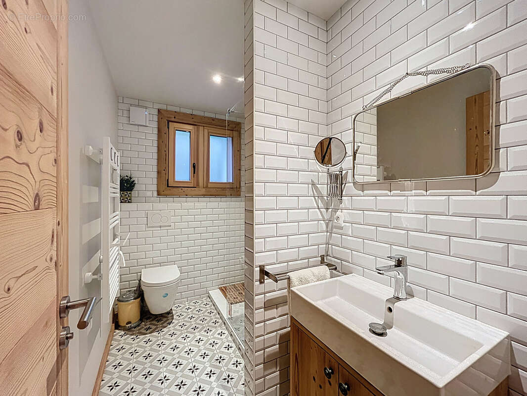Les Gets - Appartement T4 de 92 m2 - Rez-de-jardin - photo 9