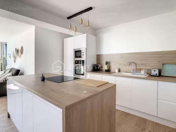 T3 68,05 - vue canal du midi – clé en main lmnp/saisonnier - garage 70m² - photo 2