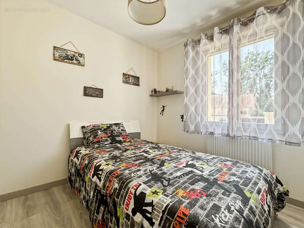 BRETENIERE - Maison plain pied 100 m2 - photo 9