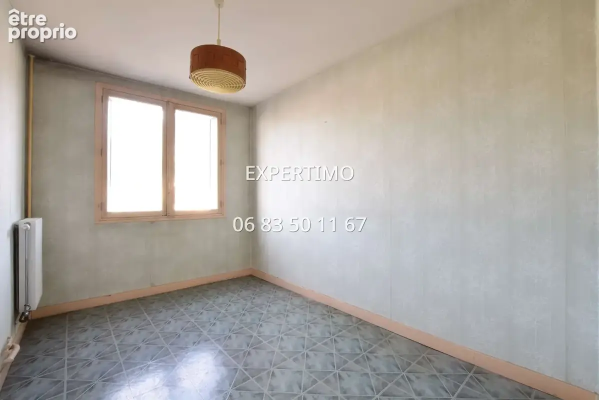 Appartement lumineux - 3 chambres poss. 4 - fort potentiel - photo 10