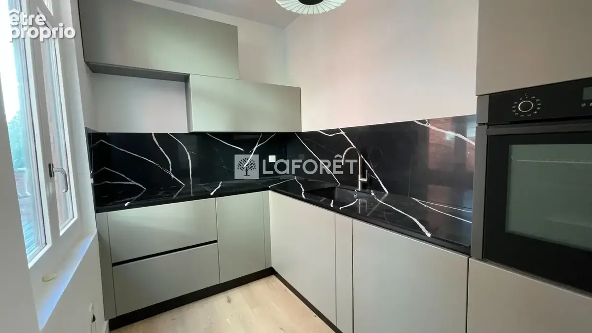 Superbe T4 de 85m² dans un immeuble de caractère - photo 10