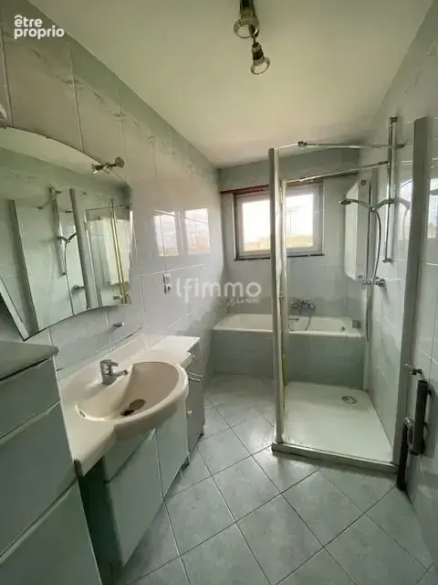 Immeuble comprenant un local commercial et deux appartements - photo 18