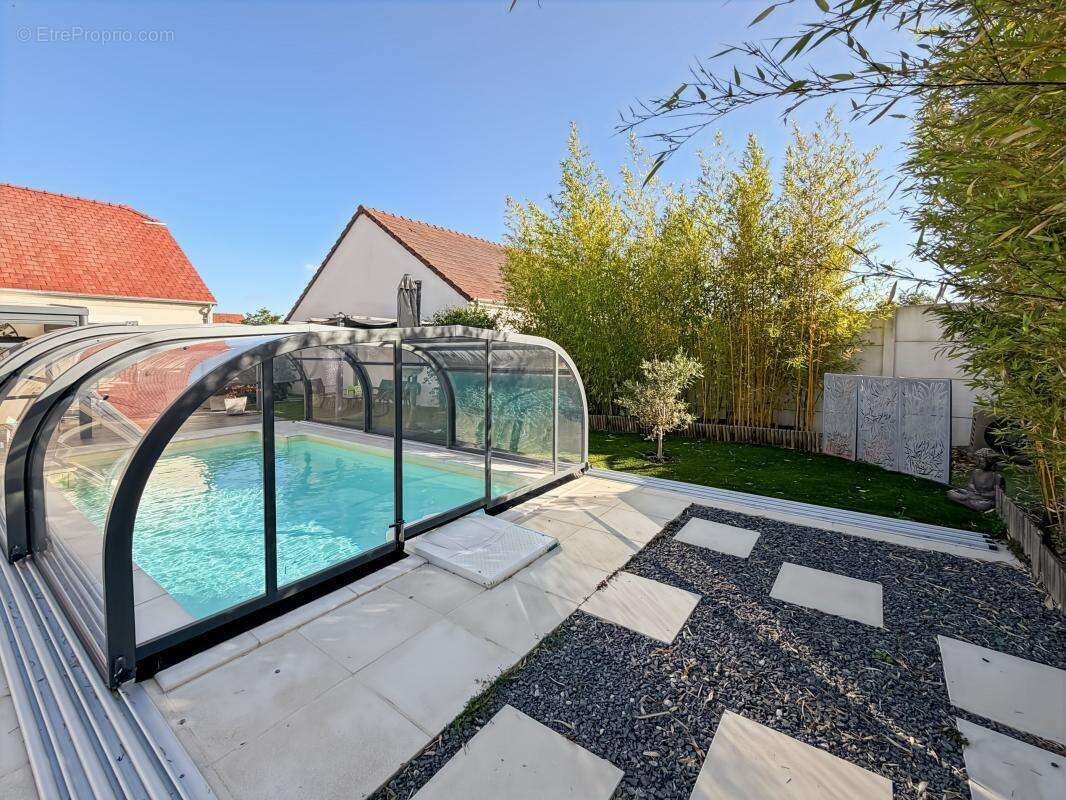 Marcilly-en-Villette – Maison de plain-pied 105 m² avec piscine couverte, jardin sans vis-à-vis et prestations soignées - photo 18