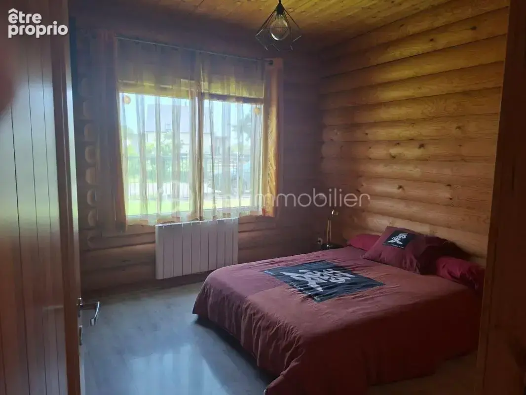Maison en rondins de bois - photo 11
