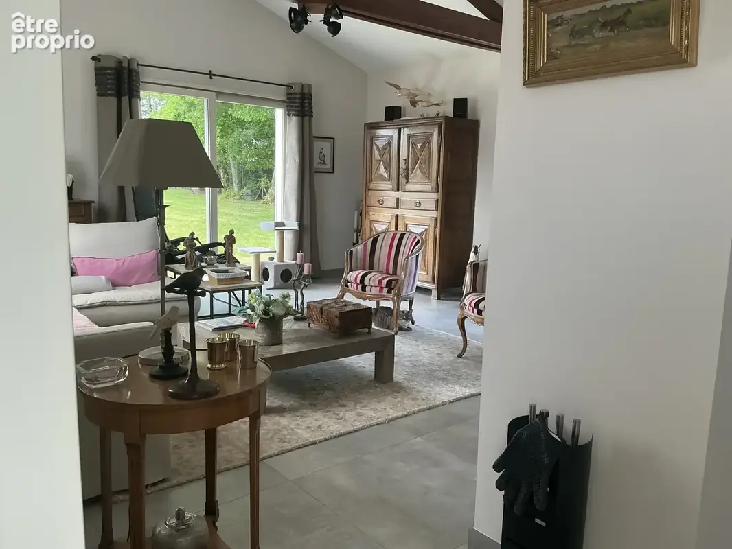 Maison offrant de belles prestations dans un cadre verdoyant et calme - photo 11