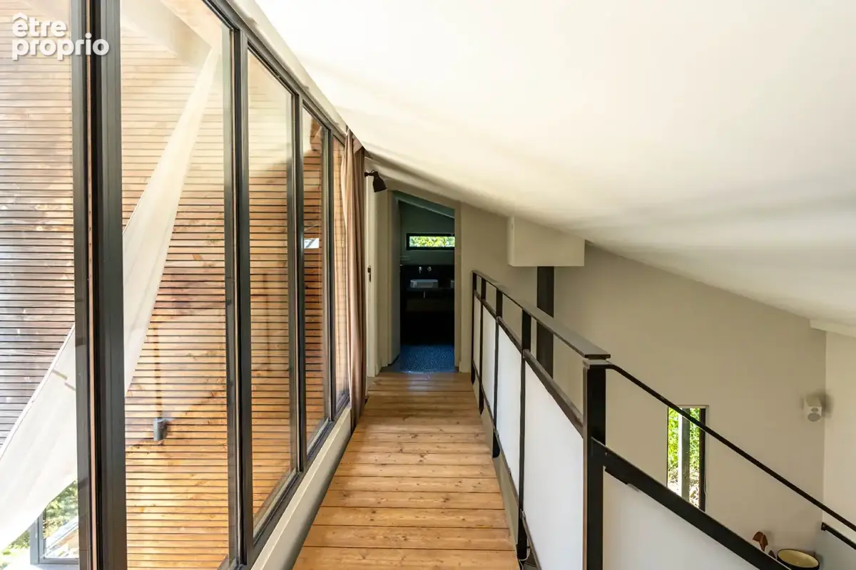 Maison d'architectes bioclimatique à ossature bois - Construction 2007 - 5P - 200m² - photo 8