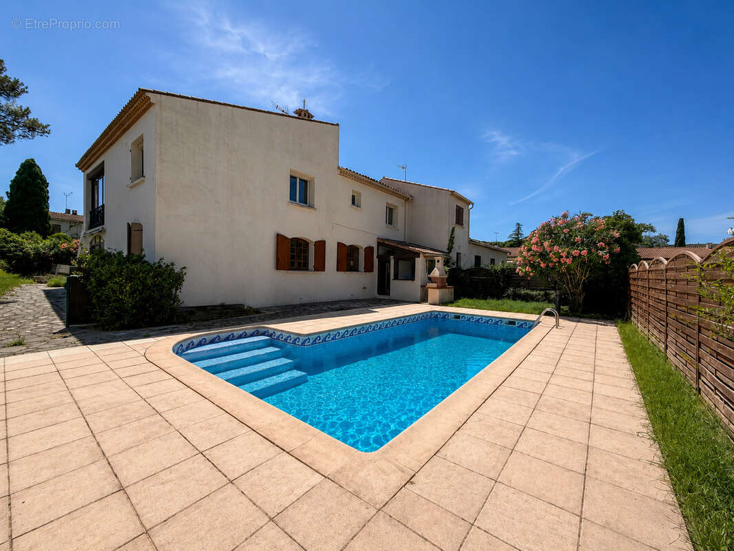 Saint-gély-du-fesc   maison familiale de 176 m2 avec piscine, double habitation et garage - photo 15