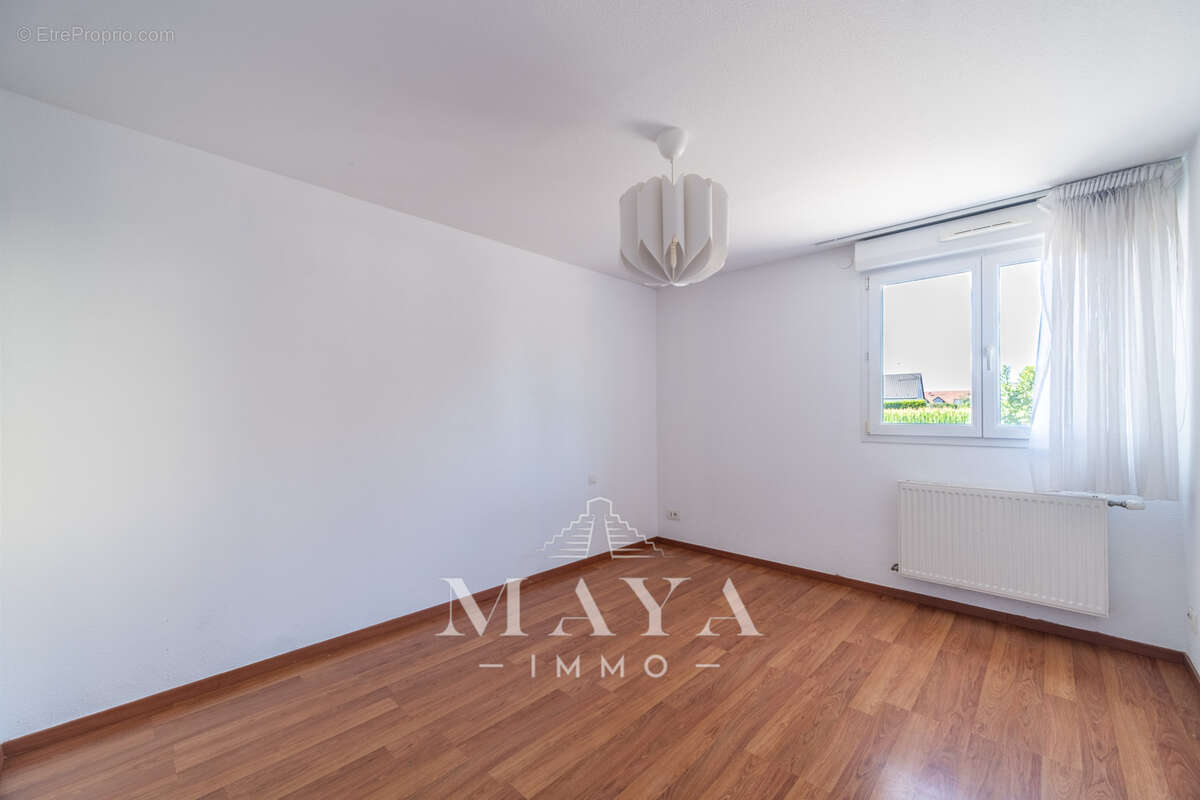 BLOTZHEIM, F3 de 73m2 avec jardin - photo 8