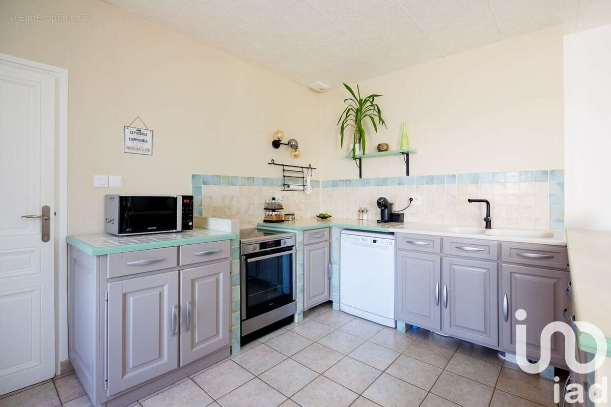 Photo 5 - Maison à SAINT-GENIS-LES-OLLIERES