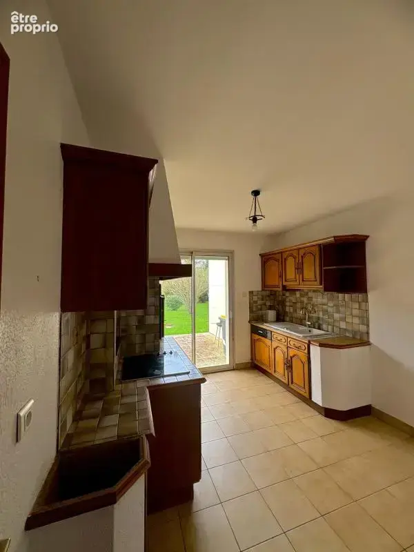 Maison Familiale avec Trois belles chambres et deux garages - photo 6