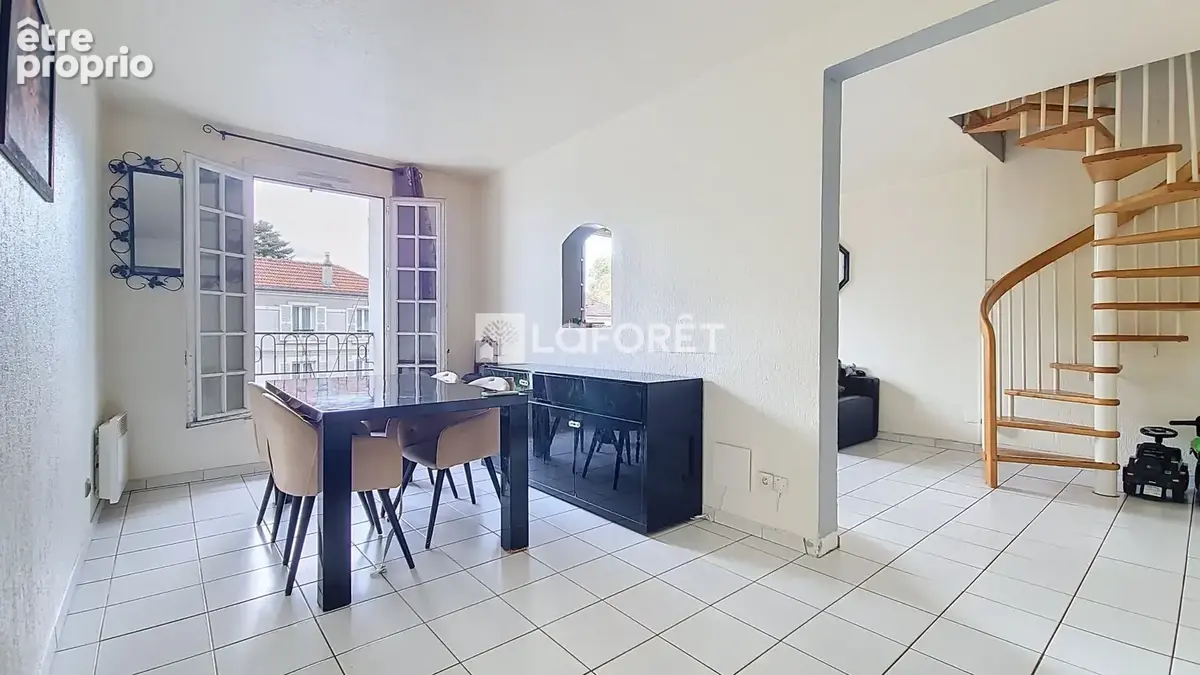 Un duplex aux volumes généreux sous les toits - photo 2