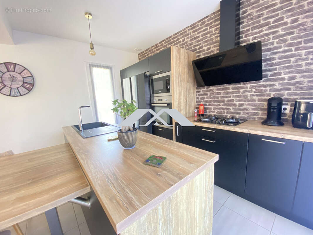 Maison 135 m² à Saint-Joseph  - photo 6