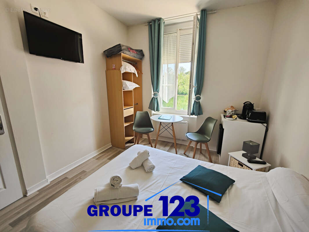 Un bien atypique avec vue sur l’Yonne et de multiples possibilités - photo 12