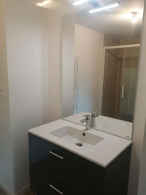 NOUVEAU dans notre agence : Appartement lumineux avec balcon, parking sécurisé et ascenseur à Bruz centre - photo 8