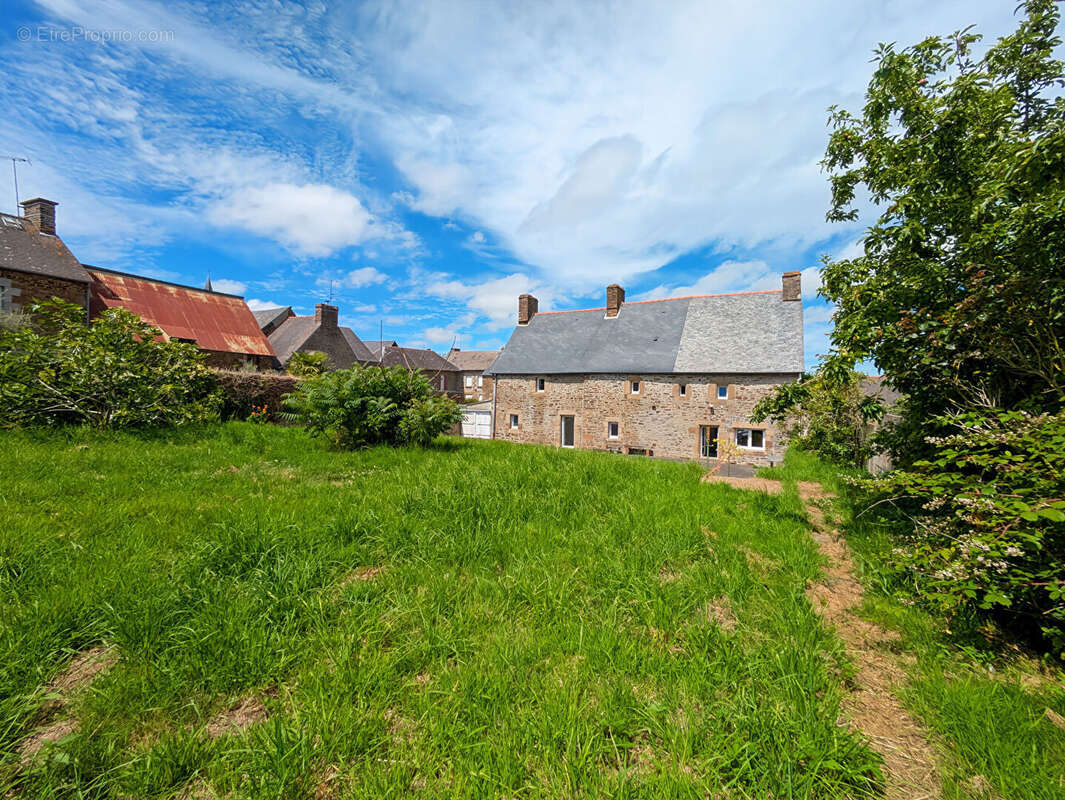 Maison à vendre - en pierre - 5 chambres - 158 m²  Sougeal - Jardin 890 m² - photo 16