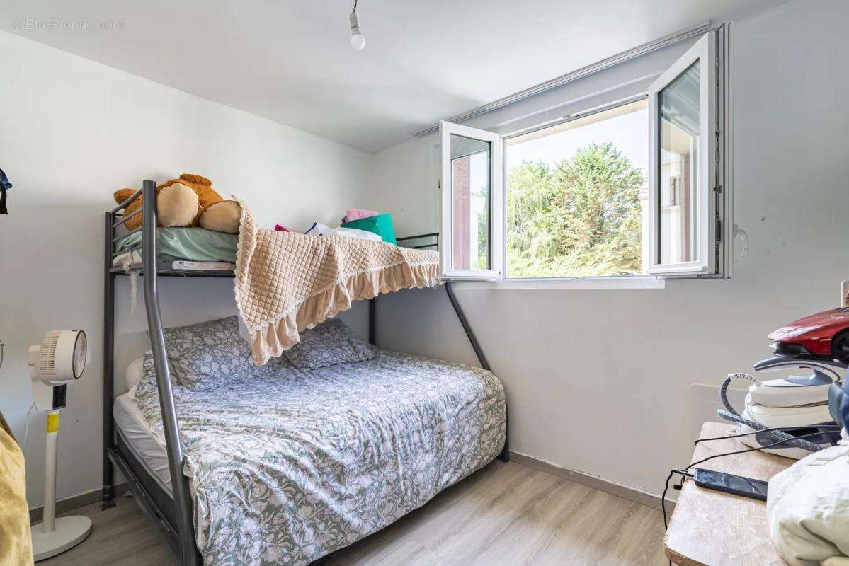 Maison de 7 pièces de 120 m² à Saint-Brice-sous-Forêt - photo 11